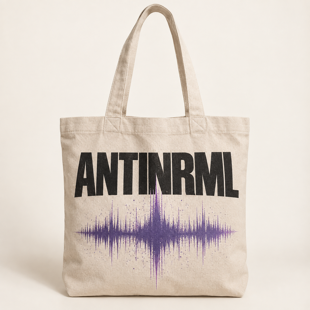 Mockup konsep AntiNRML Tote Bag — desain merch sementara, bukan foto barang produksi.